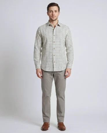 Man wearing the Cobalt Grid Shirt in handwoven khadi cotton, cornflower blue grid check on cream, full-length front view