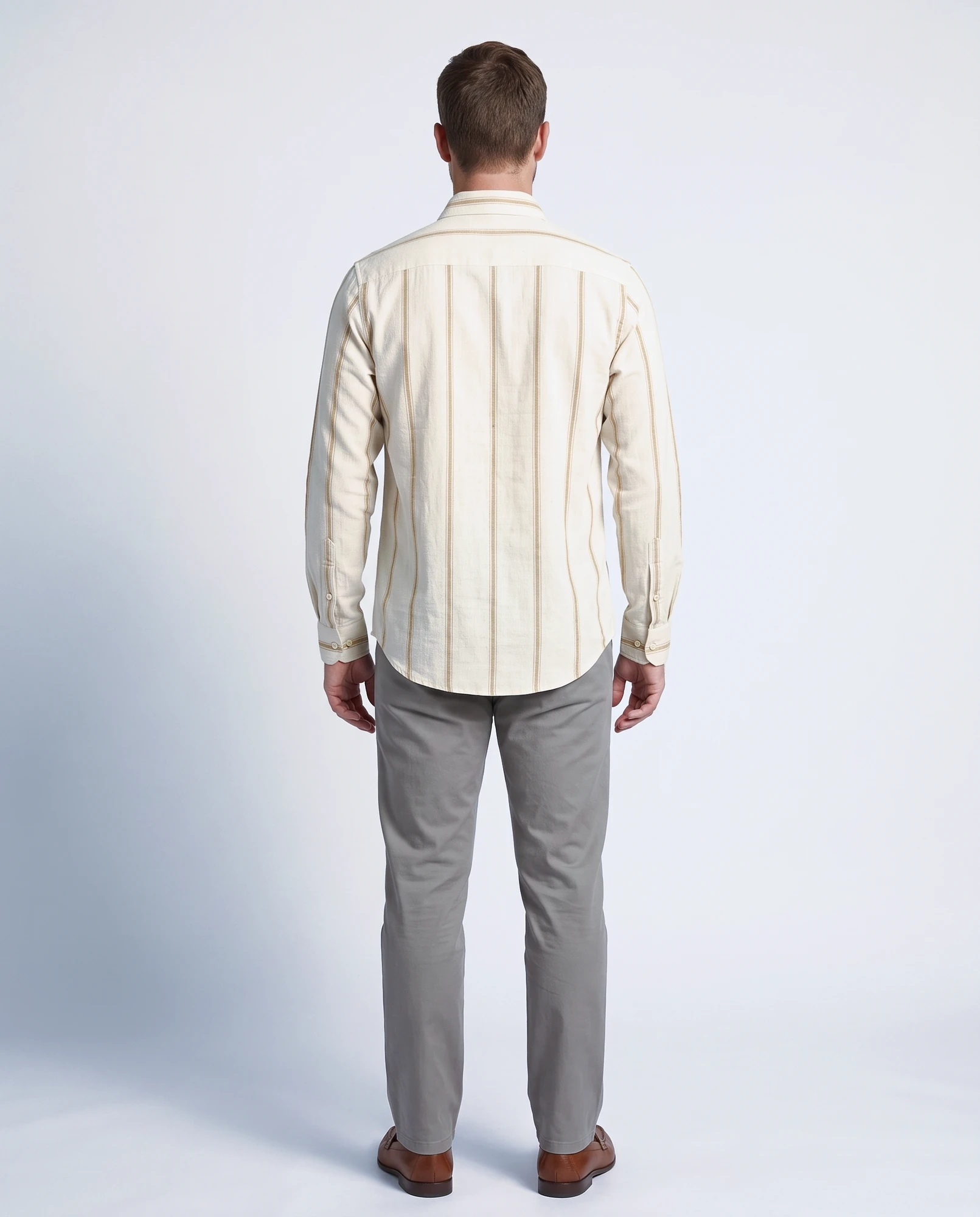Back view of the Wheat Loom khadi shirt, showing the shoulder yoke seam, full sleeves and curved hem
